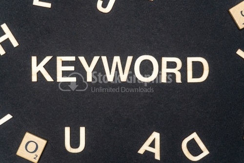 KEYWORD word written on dark paper background. KEYWORD text for your concepts