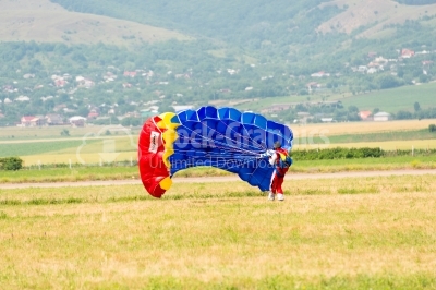Landing of the skydiver on the ground