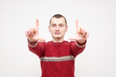 Male guy showing a loser sign