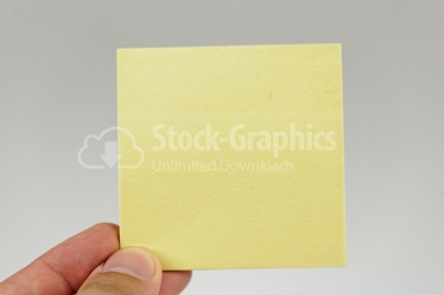 Man hand holding yellow paper, onwhite isolated background