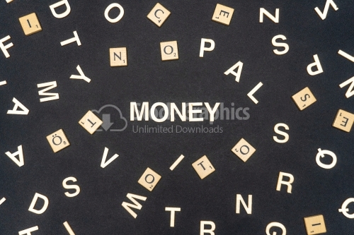 MONEY word written on dark paper background. MONEY text for your concepts