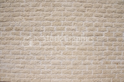 Monochrome background of an old brick stone wall