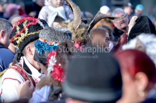 Monster / Devil mask focused on the crowd.The annual Winter Traditions and Customs Festival.