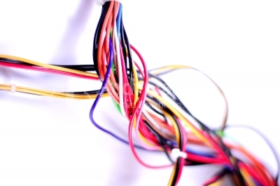 Multi colored computer cables - Stock Image