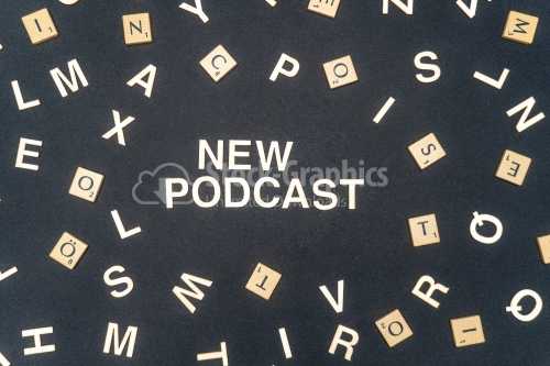 NEW PODCAST word written on dark paper background. NEW PODCAST text for your concepts