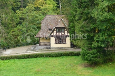 Old traditional village house in a forest