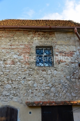 Old window on ancient building