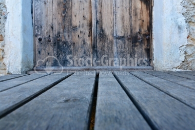 Old wood background with focused door
