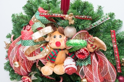 Ornamental wreath with reindeer and green candy