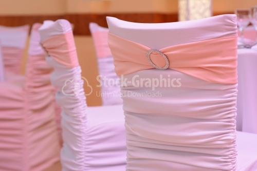 Pink bow between silver cutlery
