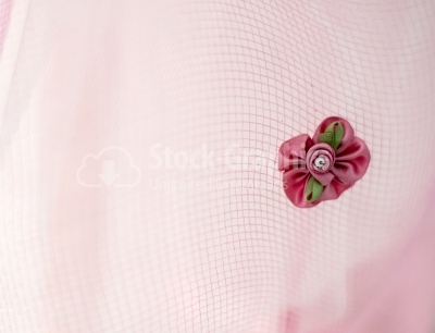 Pink flower on pink fabric