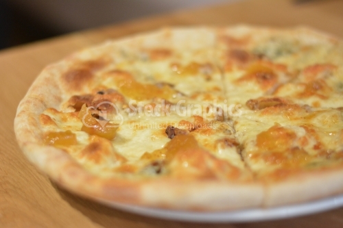 Pizza with four kinds of cheese. Italian pizza. Pizza quattro formaggi.