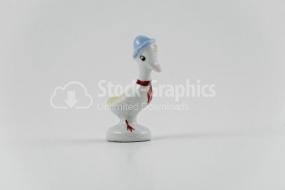 Porcelain duck figurine on white background- Stock Image
