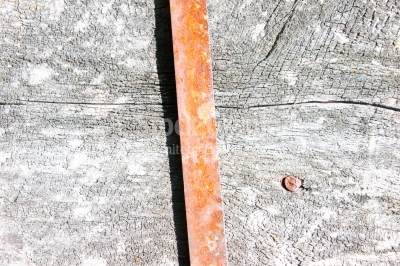 Red plank on wood