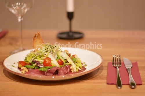 Salad of Italian prosciutto crudo or spanish jamon.
