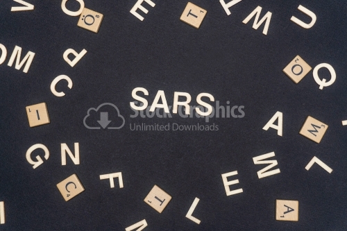 SARS word written on dark paper background. SARS text for your concepts
