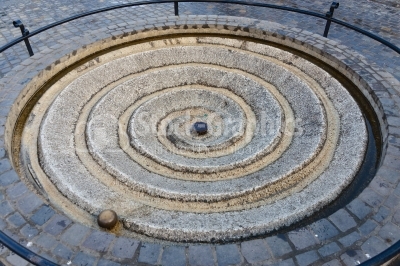 Spiral over concrete wall texture