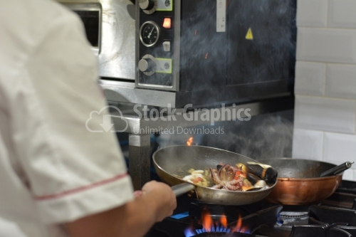 Steaming seafood in a professional restaurant kitchen. Hotel.