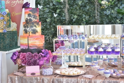 Sweet dessert table or candy bar. Wedding party. Natural light. Macaron and cupcakes .Anniversary dating one celebration.
