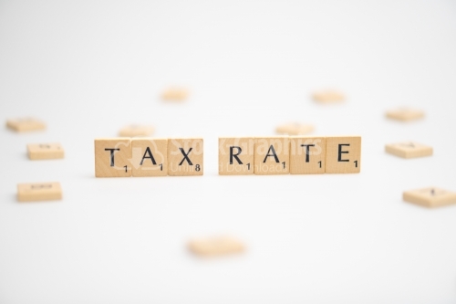 TAX RATE word written on white background. TAX RATE text on white