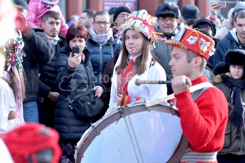 Teenagers dressed for the annual festival of winter traditions and customs. Drummer. Romania