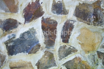 Urban stone wall with abstract pattern as creative background