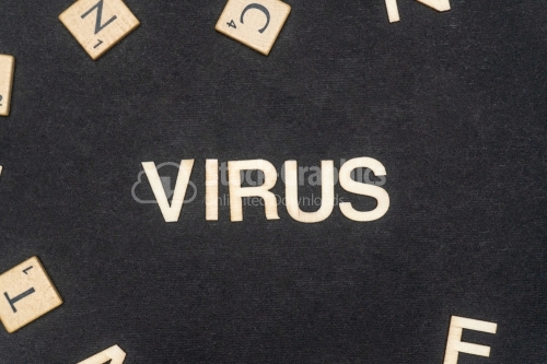 VIRUS word written on dark paper background. VIRUS text for your concepts