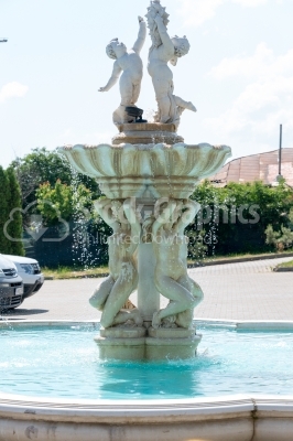 Water fountain made of marble statues