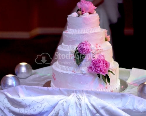 Wedding cake with pink peonies