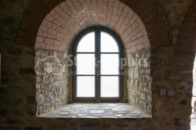 Window in a brick, old structure