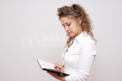 Woman holding her datebook