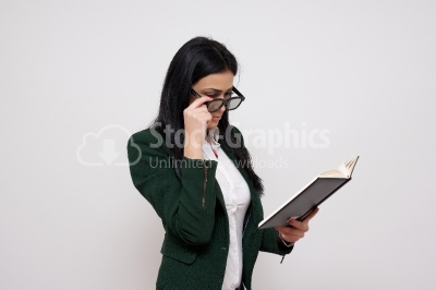 Woman holding her datebook