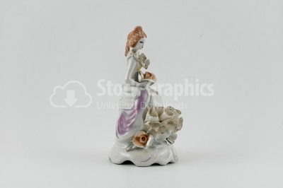 Woman statuette with a rose - Stock Image