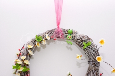 Wood wreath with pink scarf