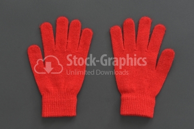 Woolen gloves isolated - red