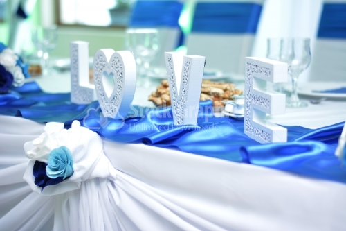Word love placed on a wedding table