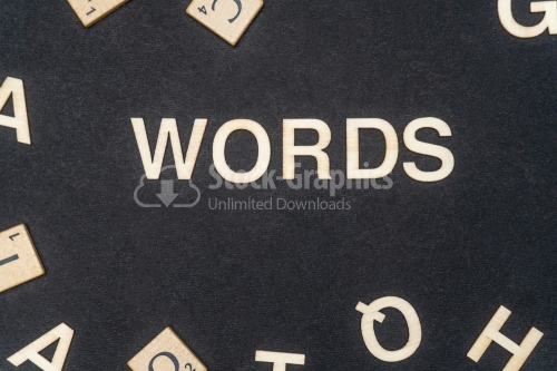 WORDS word written on dark paper background. WORDS text for your concepts