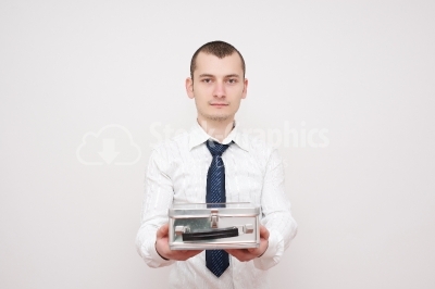 Young businessman sharing a box with you