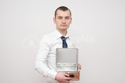 Young businessman with a open metal box