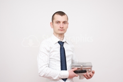 Young Man Carrying a Metal Box