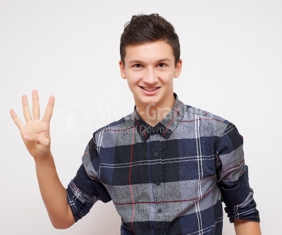 Young man showing 4 fingers