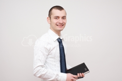 Young man with a notebook