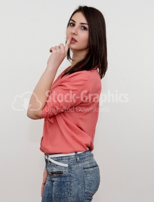 Young woman gesturing to be quiet
