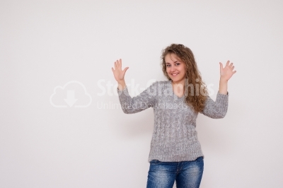 Young woman showing 10 fingers 