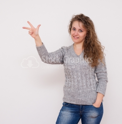 Young woman showing number 3 isolated on white 
