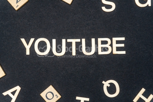 YOUTUBE word written on dark paper background. YOUTUBE text for your concepts